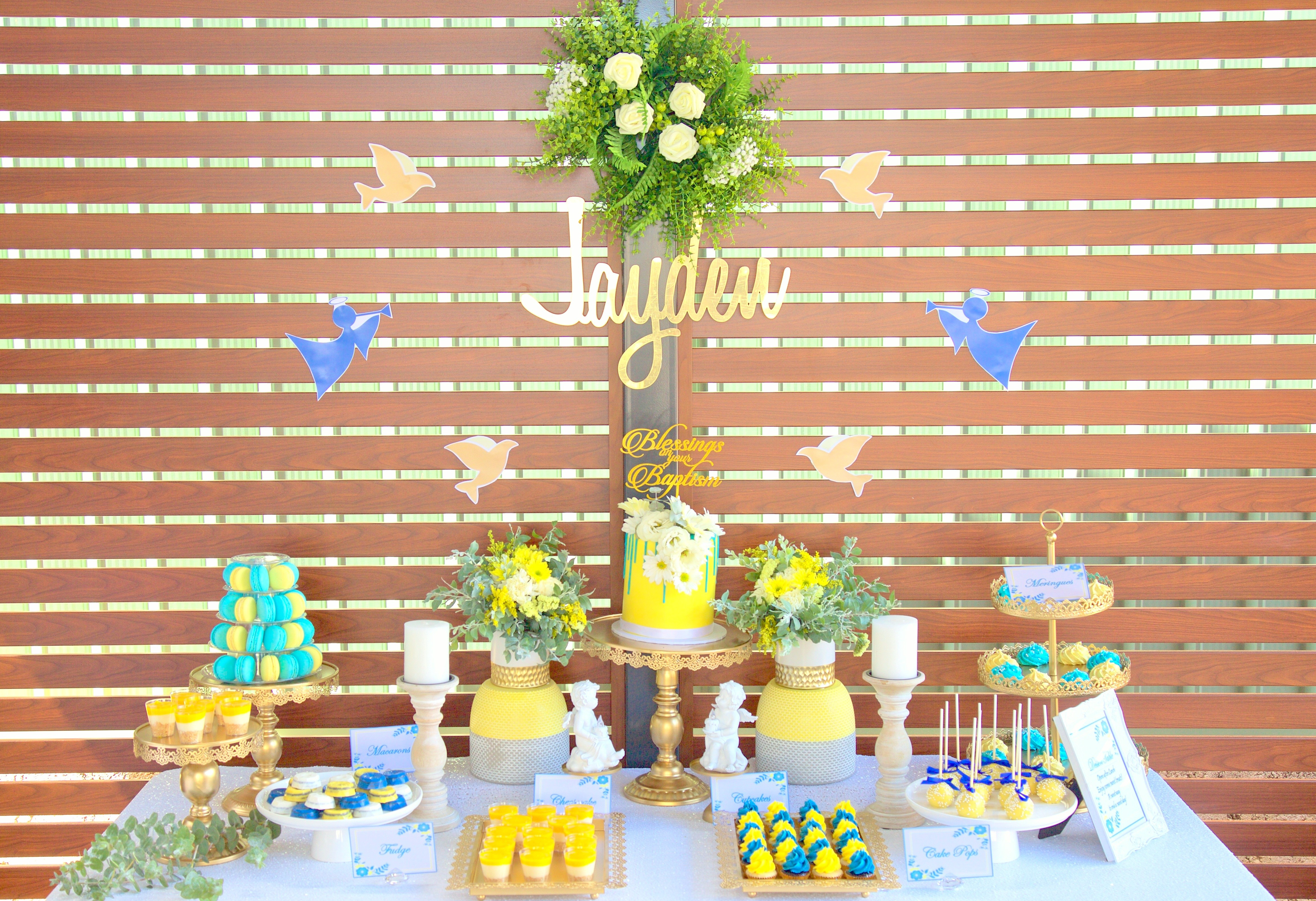 Blue and yellow themed dessert table.