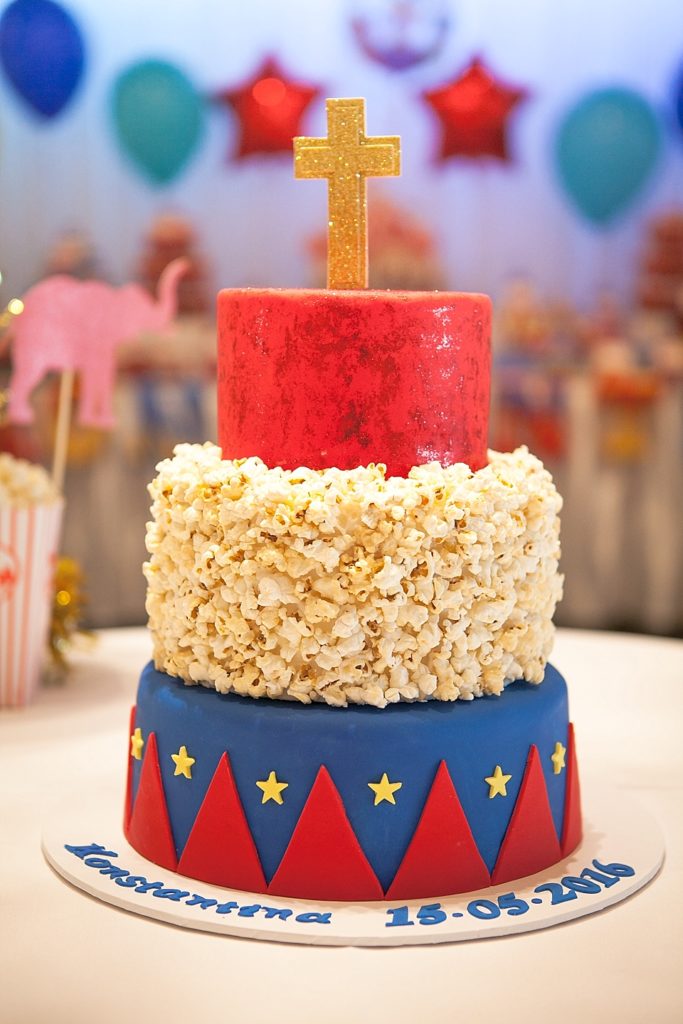 Circus-themed baptism cake