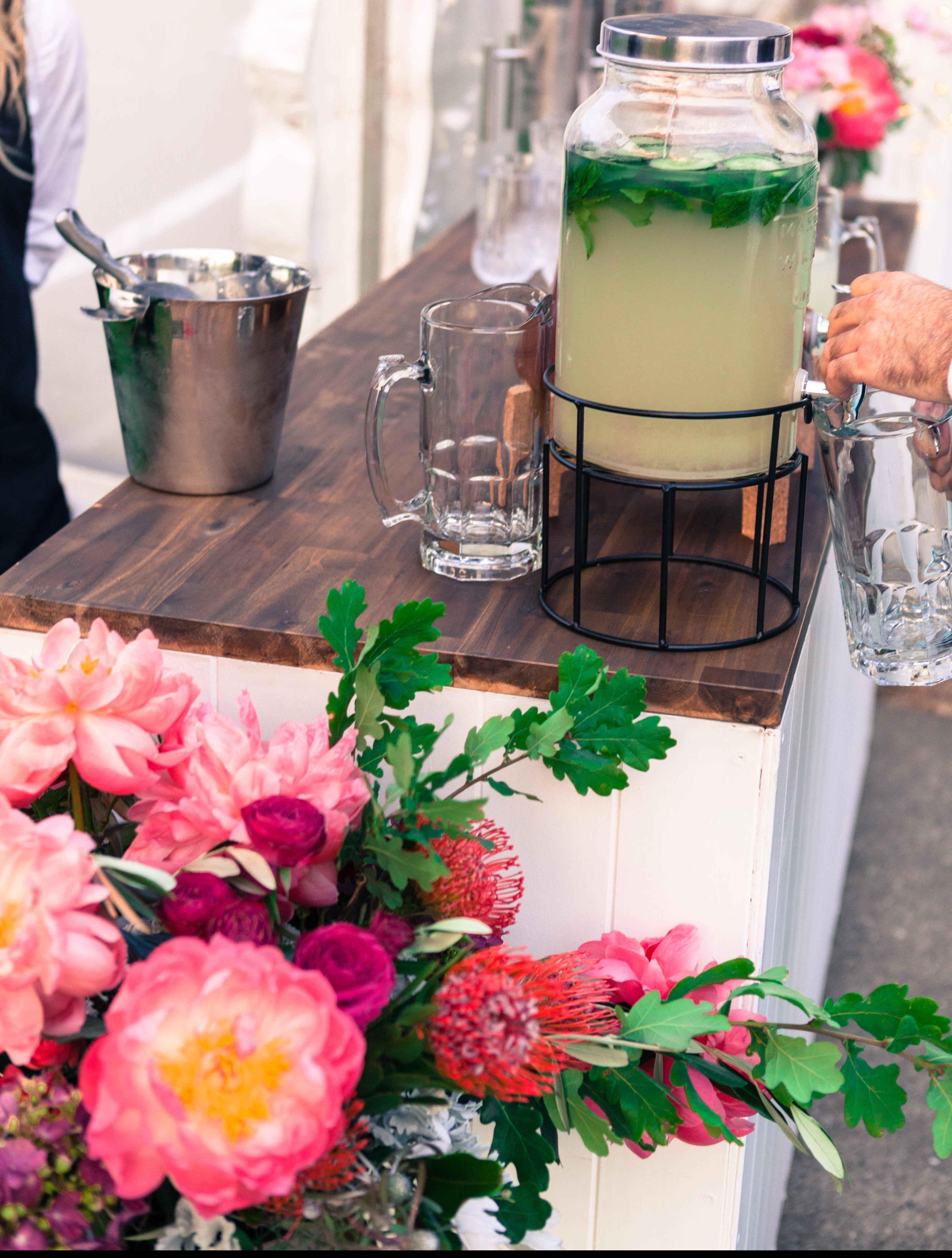 Florals embellishing the bar