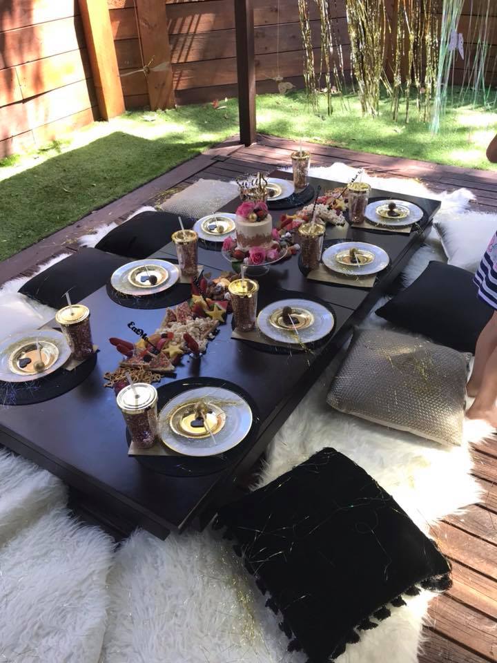 Black and gold picnic table and grazing board