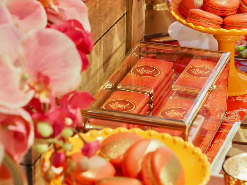Wrapped chocolate favours on a Singaporean themed dessert bar.