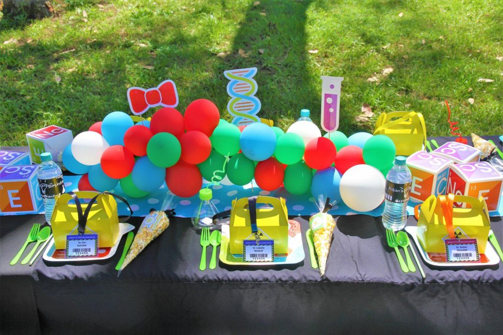 Balloon runner on science party table