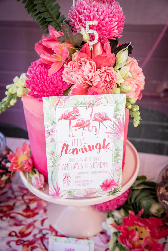 Lets flamingle invite and cake at a flamingo themed birthday party