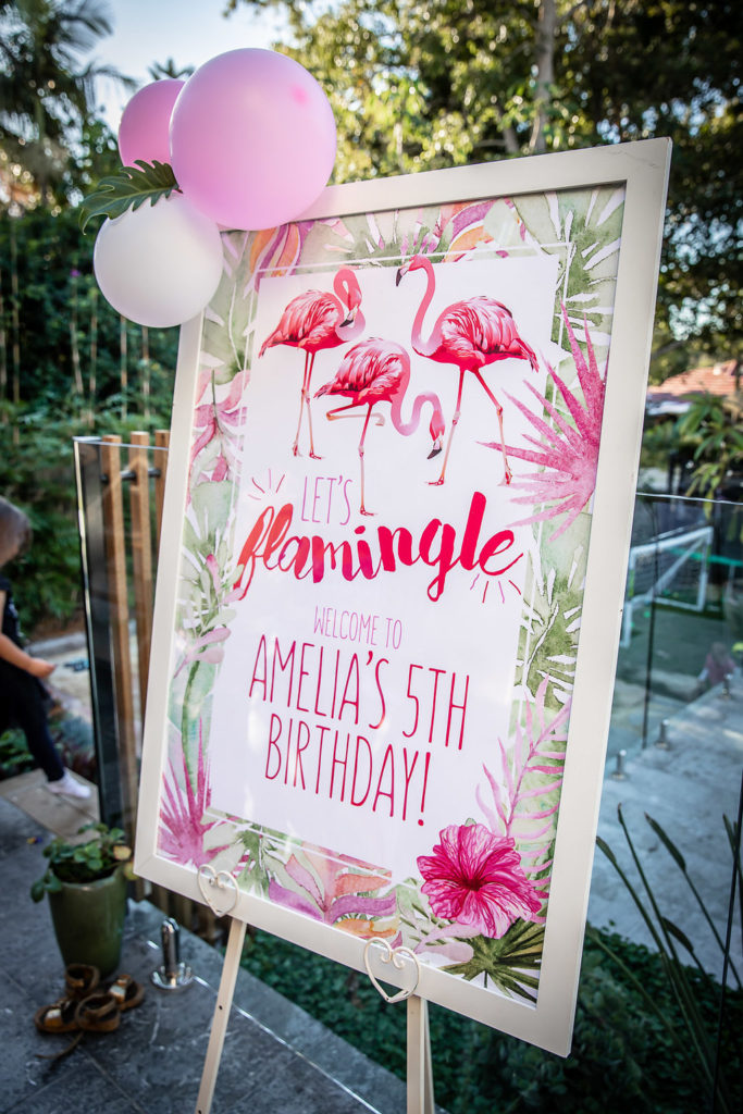 Welcome poster at the flamingo birthday party