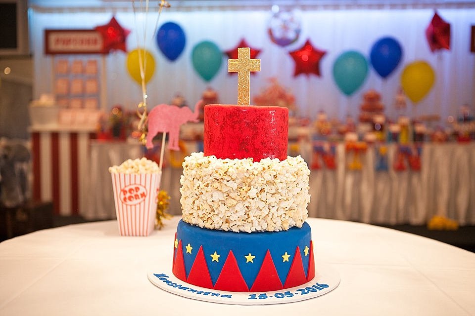 Circus-themed baptism cake