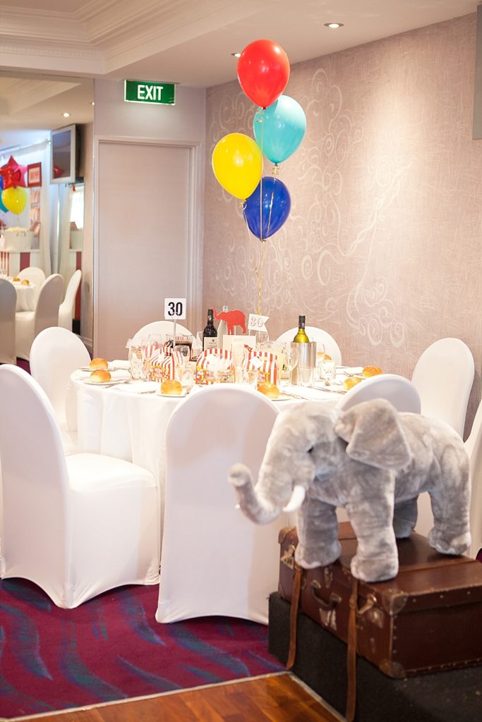 Circus-themed baptism and dessert bar