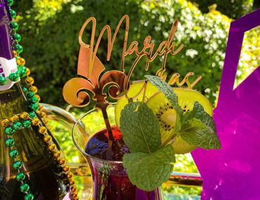 , New Orleans Mardi Gras themed engagement party
