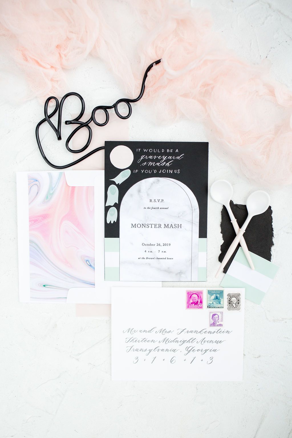 A pastel monster mash Halloween invites