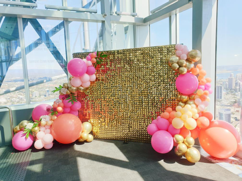 Next Event's shimmer wall in action at Skypoint on the Gold Coast. Balloons by Love & Wishes Styled Events. 