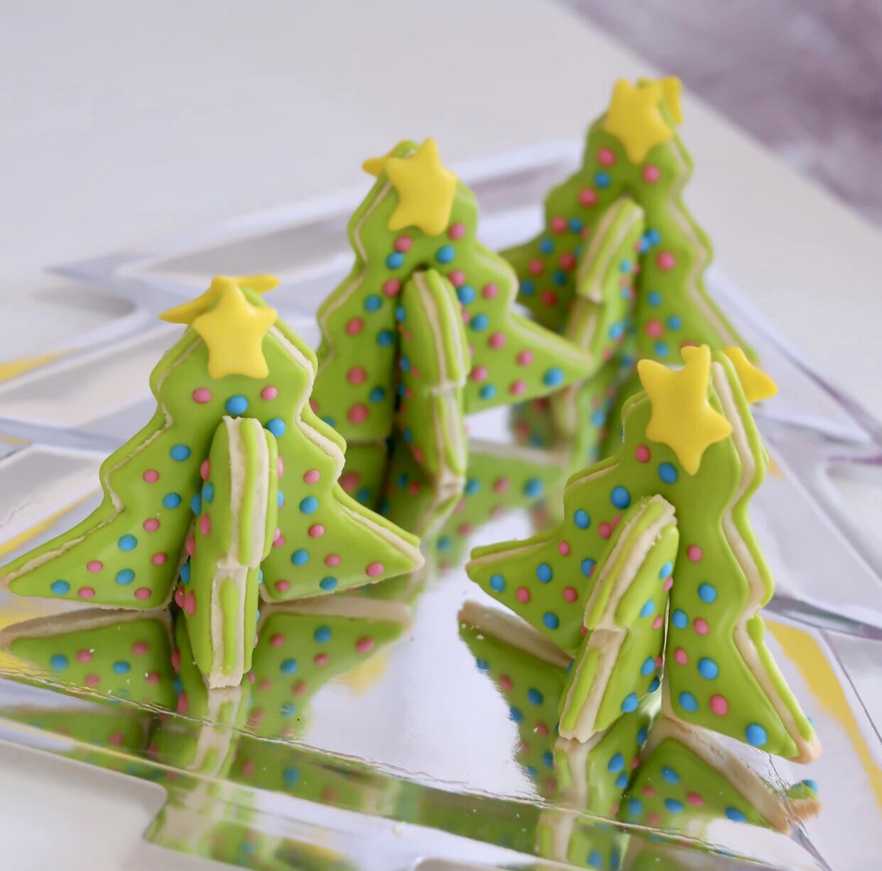 3D Christmas tree cookies in neon colours
