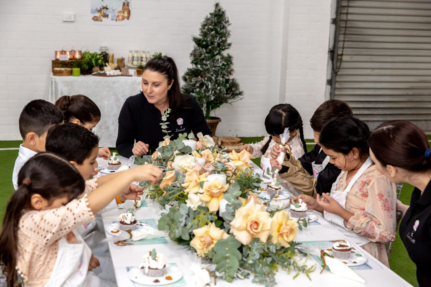 Cupcake decorating activity at the Winter woodland party